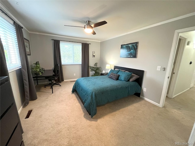 4676 White Rock Cir Unit 12, Boulder, CO 80301 - bedroom with crown molding, light carpet, a desk, and a ceiling fan