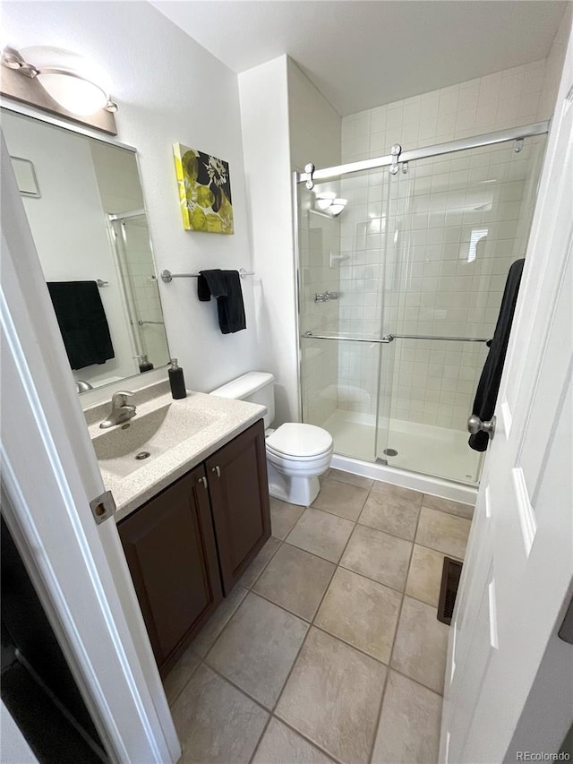 4676 White Rock Cir Unit 12, Boulder, CO 80301 - full bath featuring vanity, a shower stall, and tile patterned floors