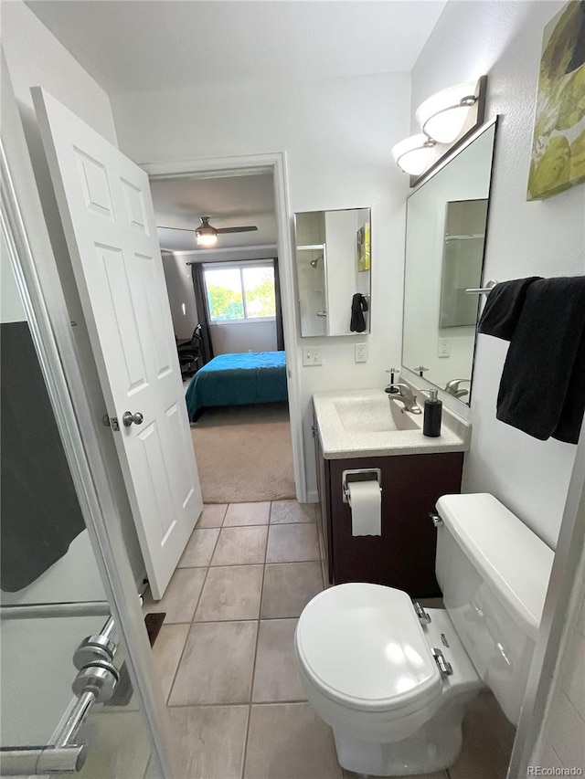 4676 White Rock Cir Unit 12, Boulder, CO 80301 - ensuite bathroom with vanity, tile patterned flooring, and a ceiling fan
