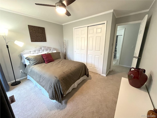 4676 White Rock Cir Unit 12, Boulder, CO 80301 - bedroom with light carpet, a closet, ornamental molding, and ceiling fan