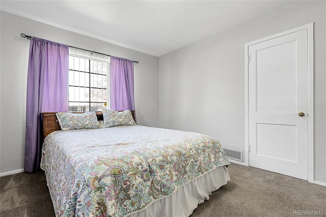 891 Ursula St, Aurora, CO 80011 - bedroom with carpet flooring and baseboards