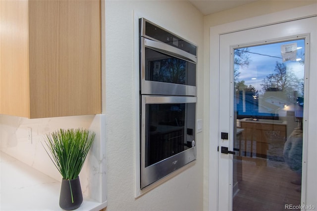 2441 W 55th Ave, Denver, CO 80221 - kitchen view of double oven and modern cabinets