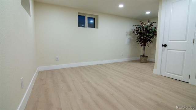 2441 W 55th Ave, Denver, CO 80221 - basement featuring wood finished floors, recessed lighting, and baseboards