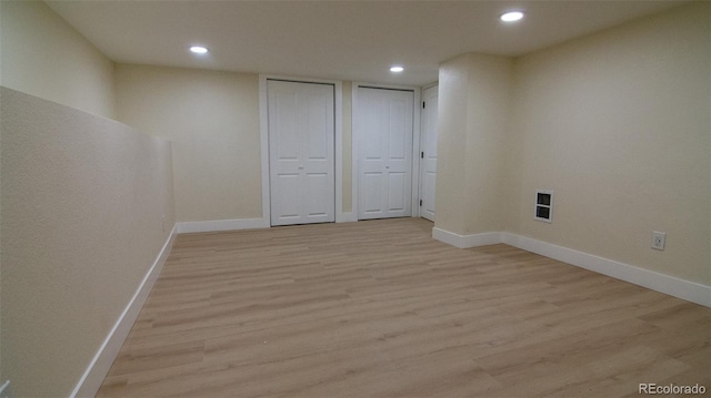 2441 W 55th Ave, Denver, CO 80221 - finished basement with recessed lighting, light wood-type flooring, and baseboards