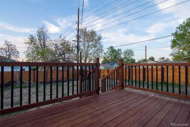 2441 W 55th Ave, Denver, CO 80221 - wooden terrace with a fenced backyard