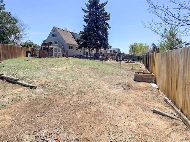 4383 S Eagle Cir, Aurora, CO 80015 - view of yard featuring a vegetable garden