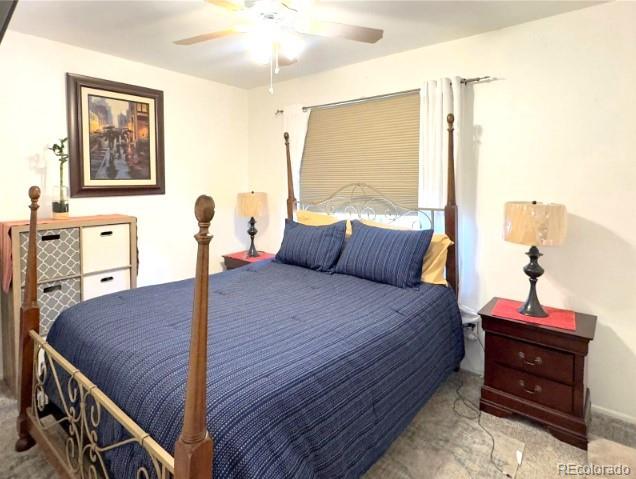 4383 S Eagle Cir, Aurora, CO 80015 - carpeted bedroom featuring ceiling fan