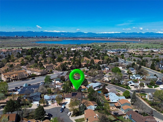 4383 S Eagle Cir, Aurora, CO 80015 - aerial perspective of suburban area with a water and mountain view