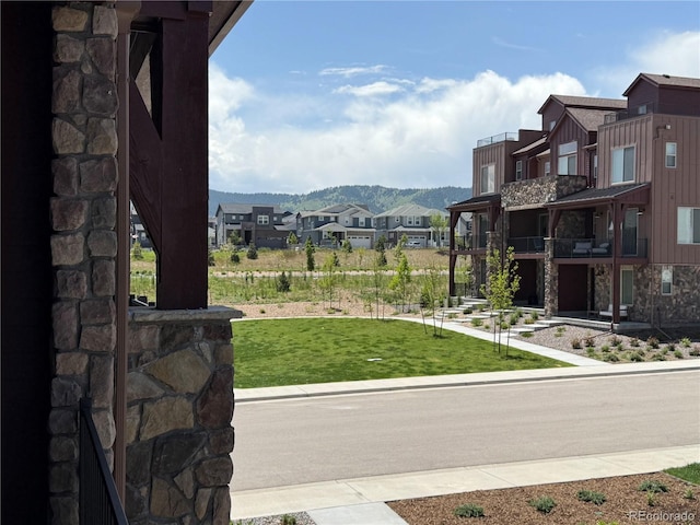9662 Browns Peak Cir, Littleton, CO 80125 - view of green lawn featuring a residential view and a mountain view