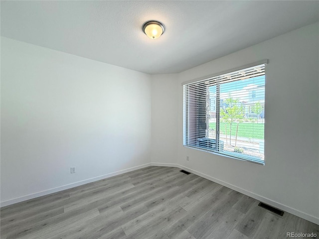 9662 Browns Peak Cir, Littleton, CO 80125 - spare room with light wood finished floors and baseboards