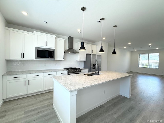 9662 Browns Peak Cir, Littleton, CO 80125 - kitchen with wall chimney range hood, built in microwave, stainless steel fridge with ice dispenser, a sink, and range with gas stovetop