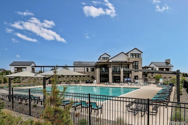 9662 Browns Peak Cir, Littleton, CO 80125 - community pool featuring a patio