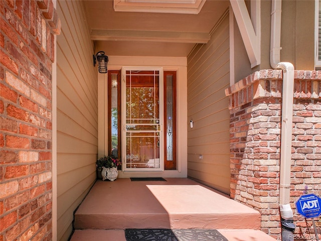 2485 Greensborough Cir, Highlands Ranch, CO 80129 - doorway to property featuring brick siding