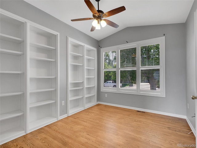 2485 Greensborough Cir, Highlands Ranch, CO 80129 - unfurnished room featuring a ceiling fan, light wood-style flooring, and vaulted ceiling