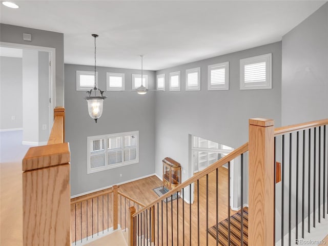 2485 Greensborough Cir, Highlands Ranch, CO 80129 - stairs featuring wood finished floors and baseboards