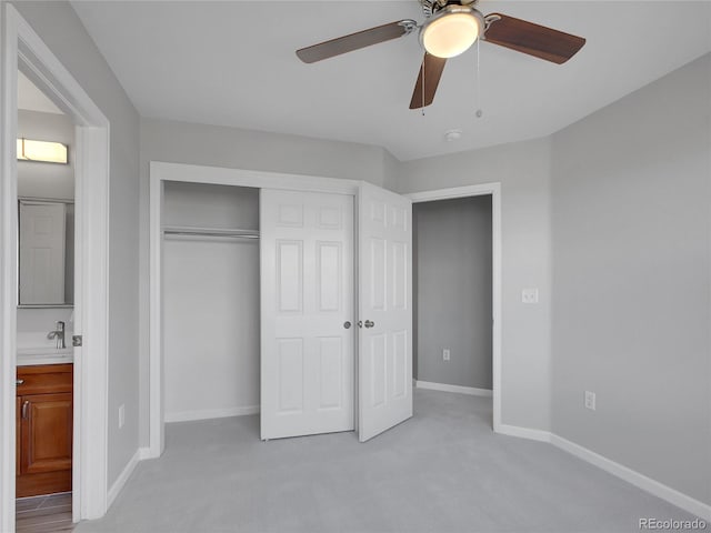 2485 Greensborough Cir, Highlands Ranch, CO 80129 - unfurnished bedroom with light carpet, a closet, and ceiling fan