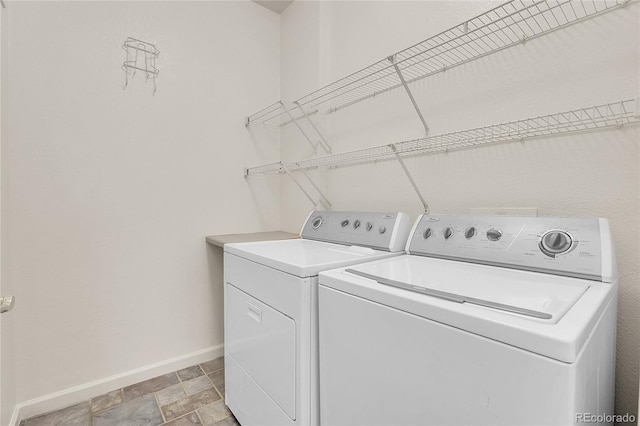 laundry area with washing machine and dryer