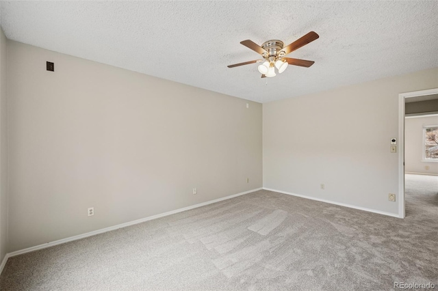 5849 Chokecherry Dr, Colorado Springs, CO 80919 - carpeted empty room with baseboards, a ceiling fan, and a textured ceiling