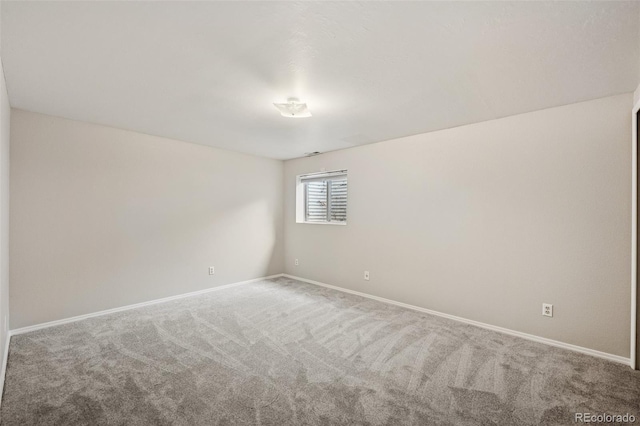 5849 Chokecherry Dr, Colorado Springs, CO 80919 - carpeted spare room featuring baseboards