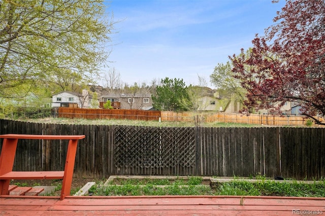 5849 Chokecherry Dr, Colorado Springs, CO 80919 - view of yard featuring a fenced backyard and a residential view