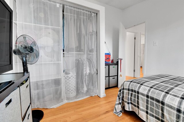 2580 Valley View Dr, Denver, CO 80221 - bedroom featuring wood finished floors and a closet