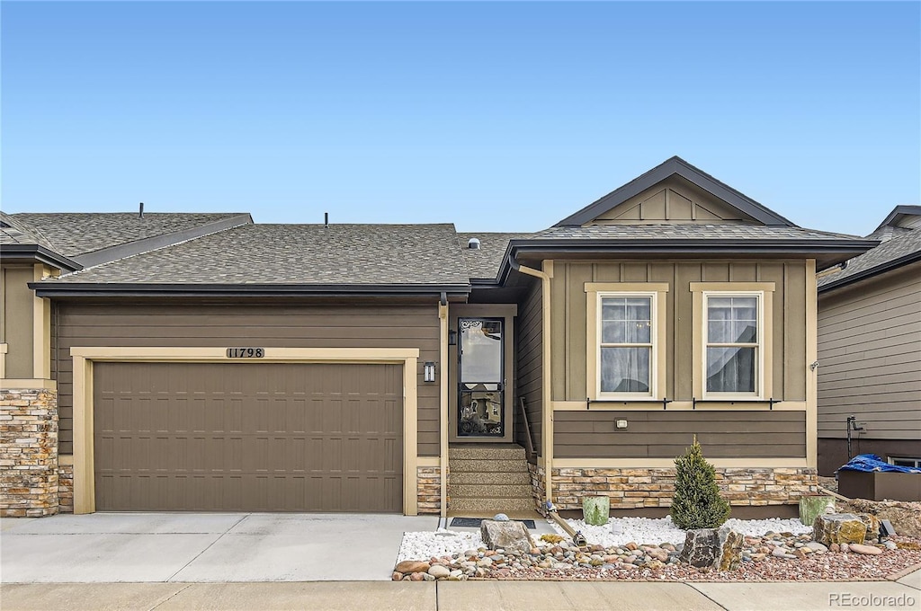 ranch-style house featuring a garage