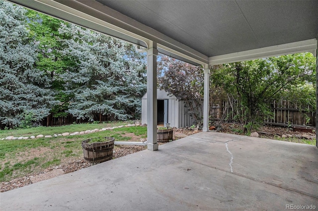 523 E Long Ct, Littleton, CO 80122 - view of patio featuring a storage shed