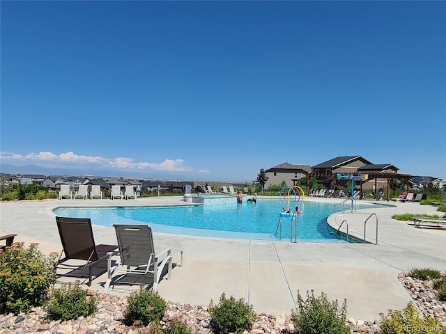 6129 E 143rd Ave, Thornton, CO 80602 - community pool featuring a patio