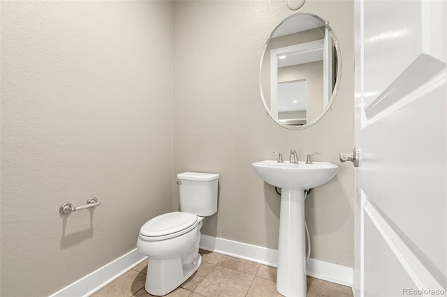 6129 E 143rd Ave, Thornton, CO 80602 - bathroom with toilet and tile patterned flooring