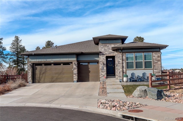 prairie-style home featuring a garage