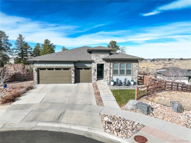 prairie-style house featuring a garage