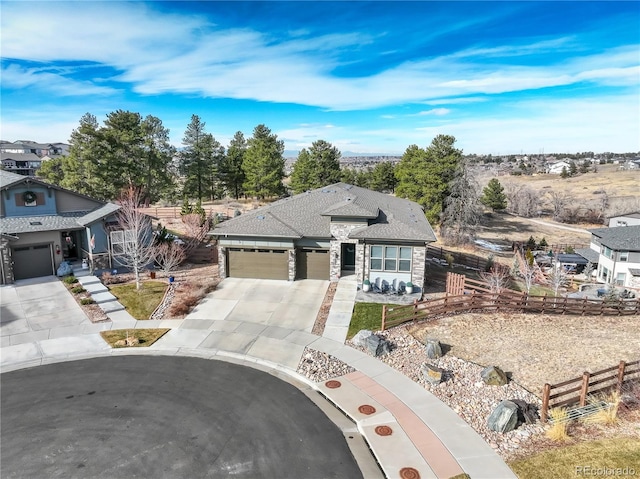 view of front of property with a garage