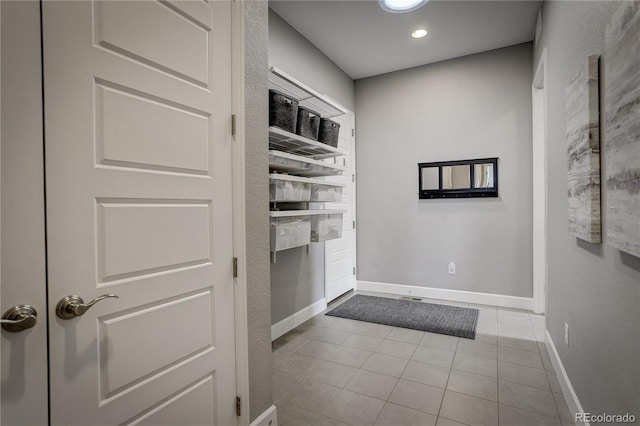 interior space featuring light tile patterned floors