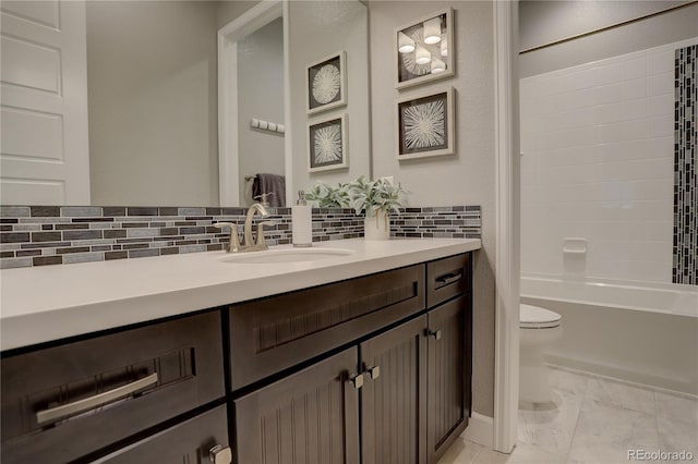 full bathroom featuring vanity, toilet, shower / bath combination, and backsplash