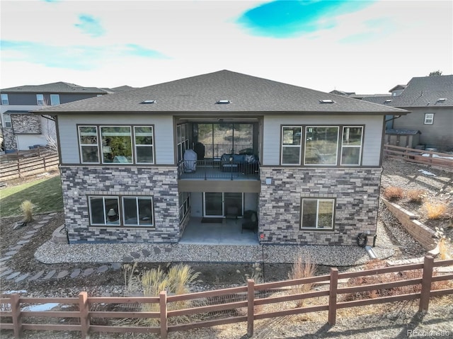 rear view of property with a patio