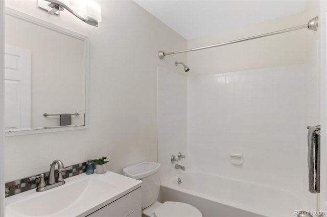 full bath with shower / washtub combination, toilet, and vanity