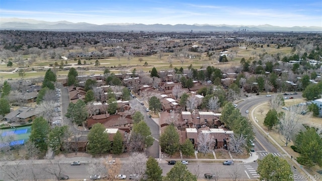 drone / aerial view featuring a residential view and a mountain view