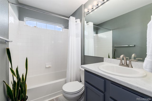 4797 Flower St, Wheat Ridge, CO 80033 - full bath featuring shower / bathtub combination with curtain, vanity, and toilet