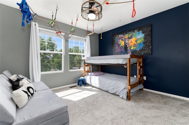 4797 Flower St, Wheat Ridge, CO 80033 - carpeted bedroom featuring baseboards