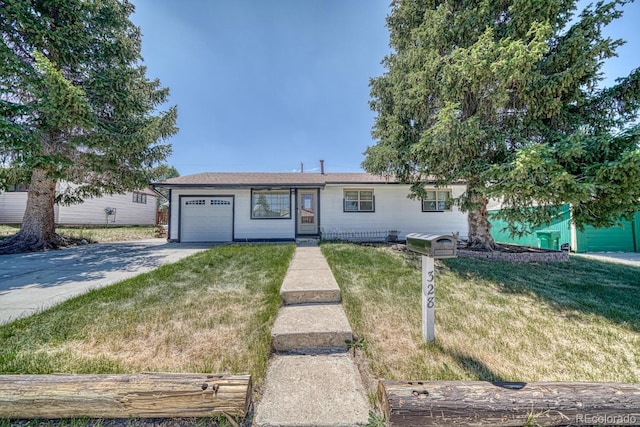 ranch-style house with a garage and a front yard