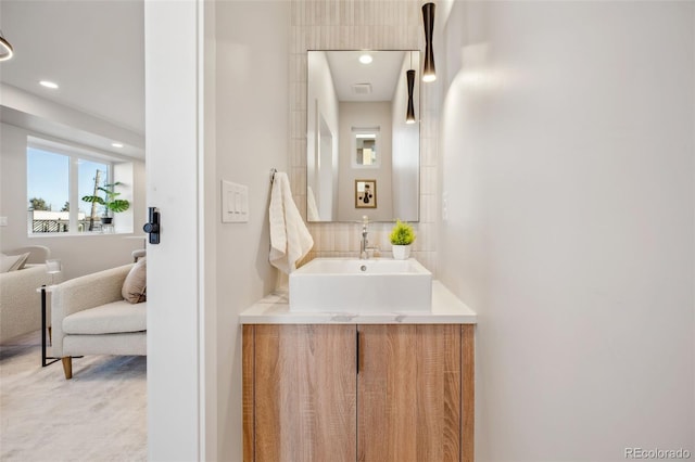 bathroom with vanity and recessed lighting