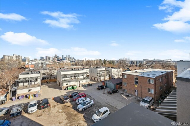 birds eye view of property with a city view
