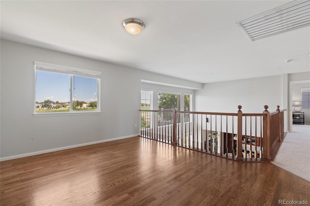 1461 S Grand Baker St, Aurora, CO 80018 - empty room with wood finished floors and baseboards