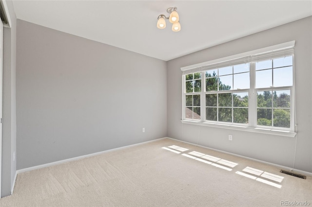 1461 S Grand Baker St, Aurora, CO 80018 - carpeted spare room featuring baseboards