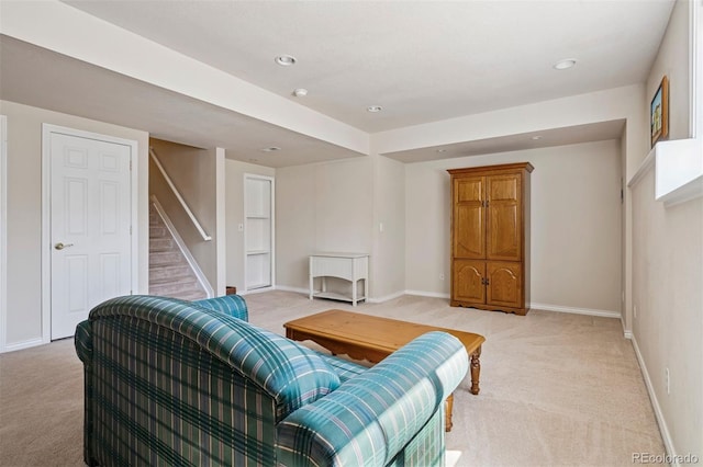 living area featuring light carpet, stairway, baseboards, and recessed lighting