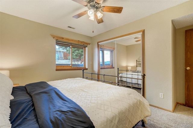 1011 S S, Woodland Park, CO 80863 - bedroom featuring carpet, baseboards, and a ceiling fan