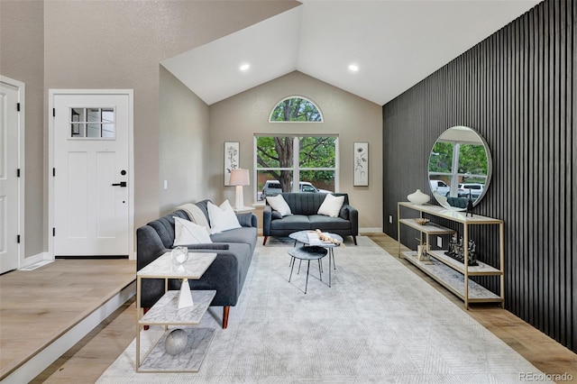 9371 Princeton Ln, Highlands Ranch, CO 80130 - living room with healthy amount of natural light, wood finished floors, and high vaulted ceiling