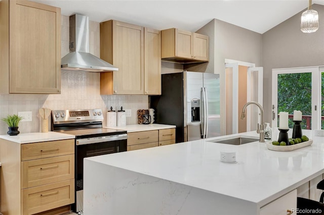 9371 Princeton Ln, Highlands Ranch, CO 80130 - kitchen with wall chimney range hood, appliances with stainless steel finishes, light brown cabinetry, and decorative backsplash