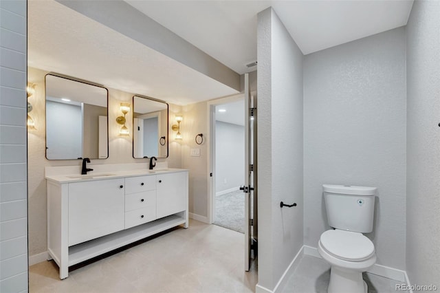 9371 Princeton Ln, Highlands Ranch, CO 80130 - full bathroom with double vanity and baseboards