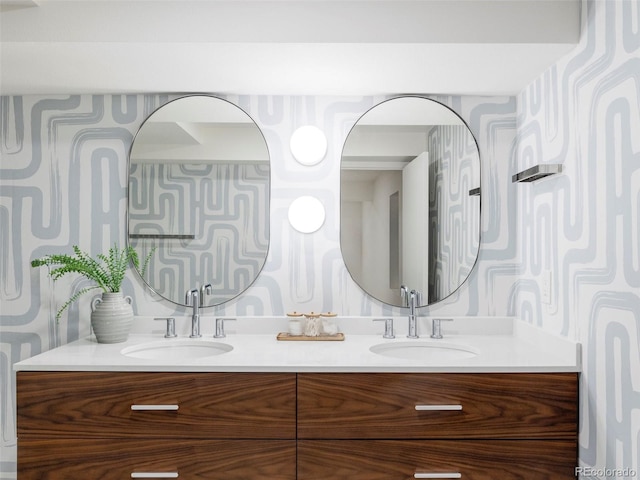 bathroom with double vanity and a sink